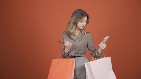 Young-woman-shopping-on-the-phone.